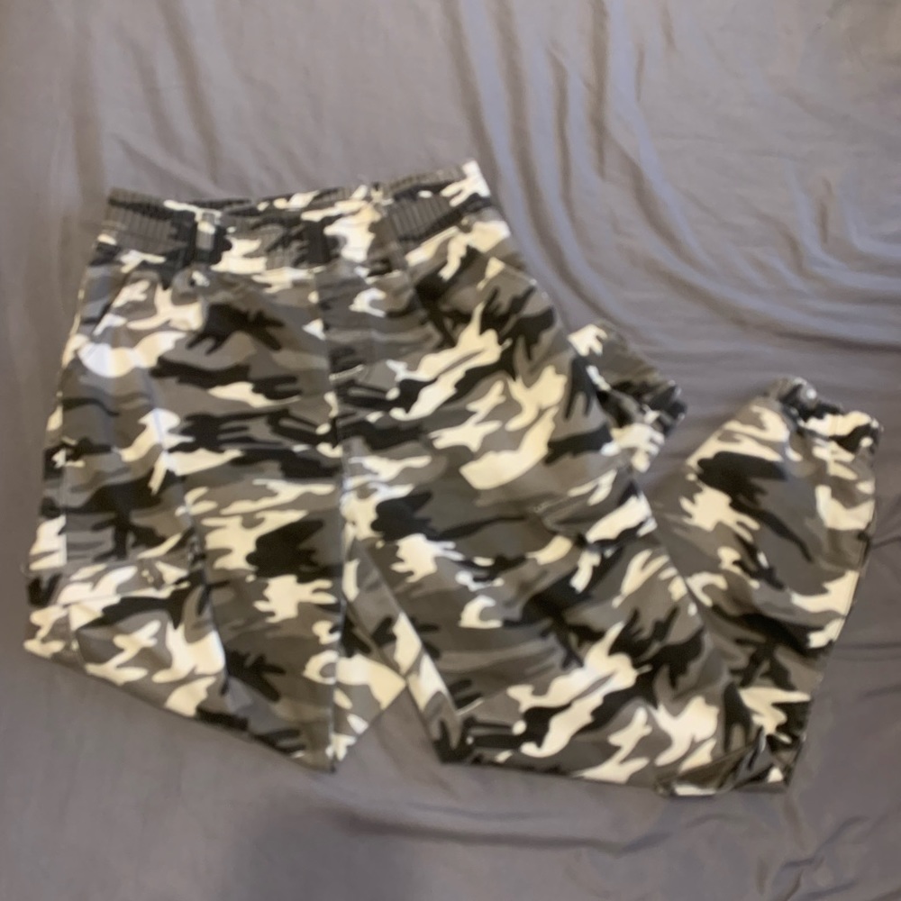 Black, white, and grey camo jeans.